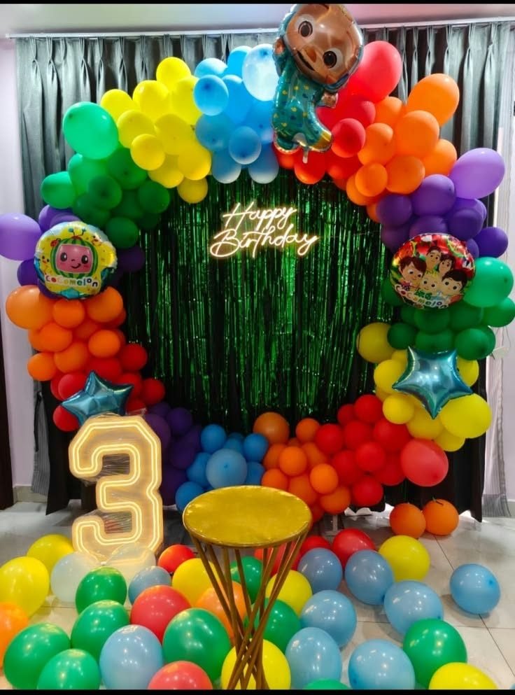 Colourful rainbow theme party balloon decoration