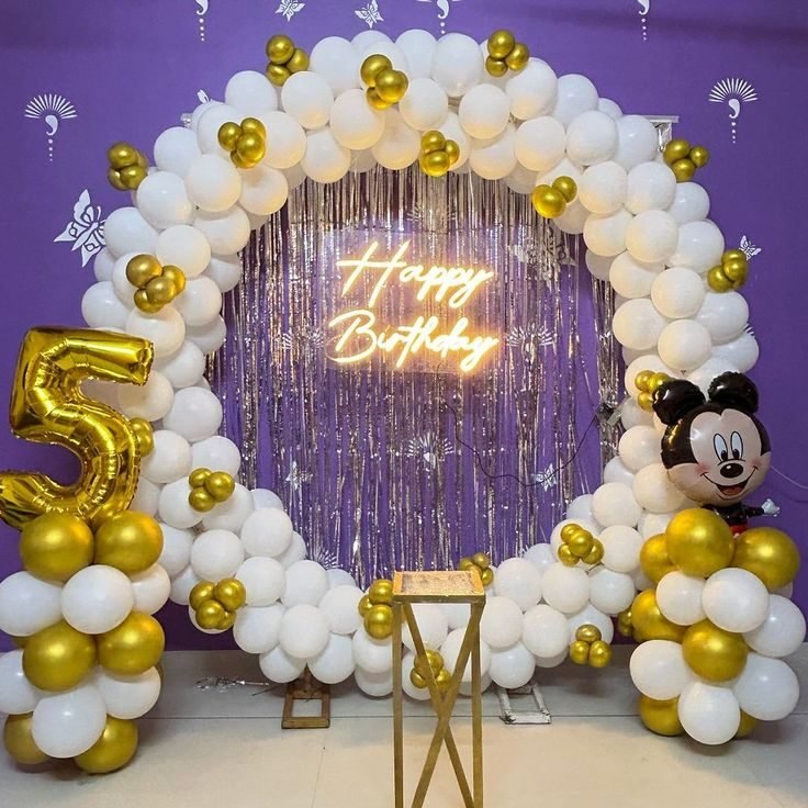 Helium balloon decoration with gold number balloon and character balloon